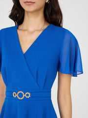Crossover Peplum Top With Metal Belt