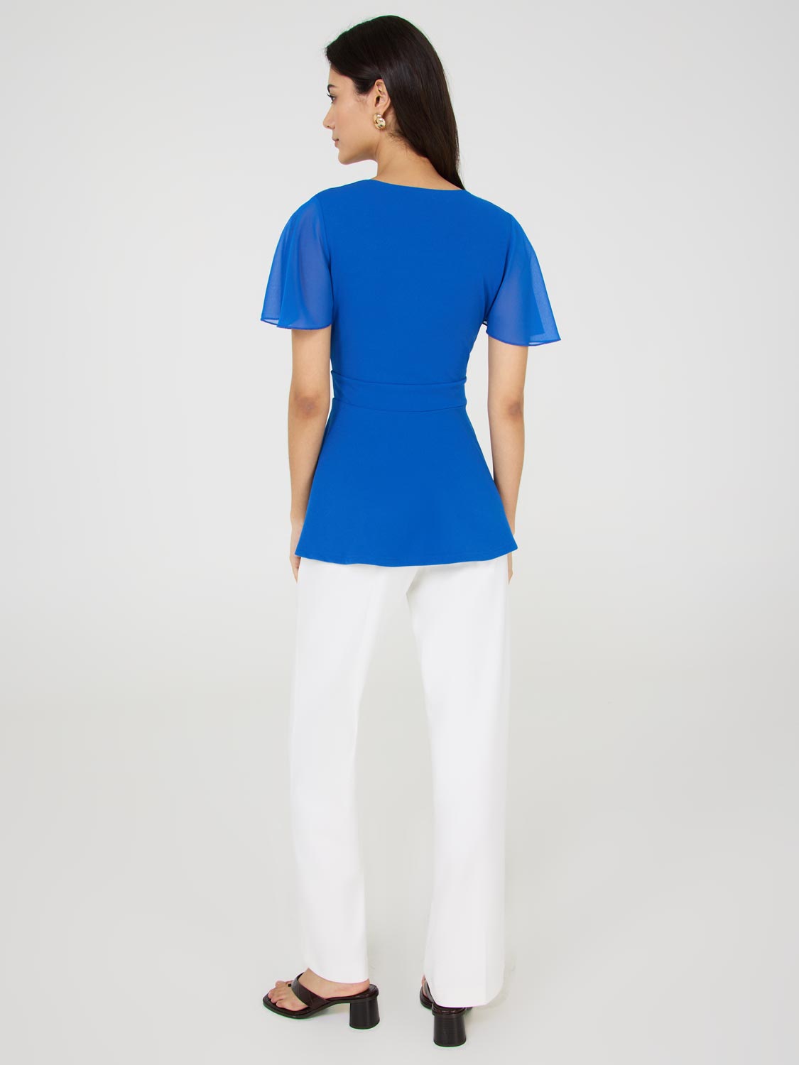 Crossover Peplum Top With Metal Belt