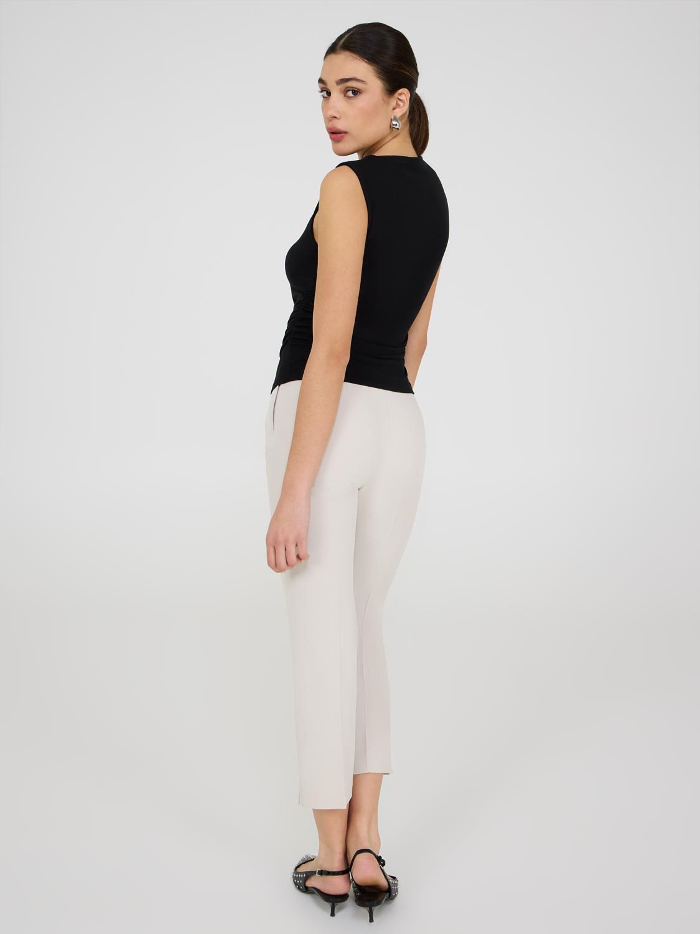 Sleeveless Ruffle Front Top