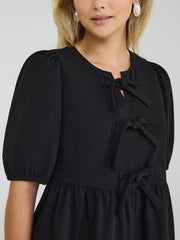 Crepe Peplum Top With Tie Front Details